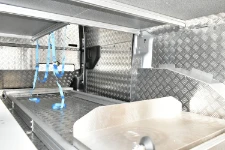 03_Ripiano inferiore destro Expert con slitta portacofano e cinghie